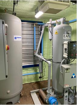 Shipping container with air compressor exterior solution air dryers